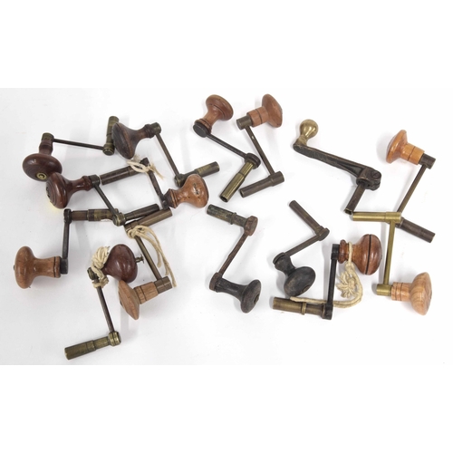 2125 - Fifteen crank handled clock winding keys, with turned wooden handles (15)