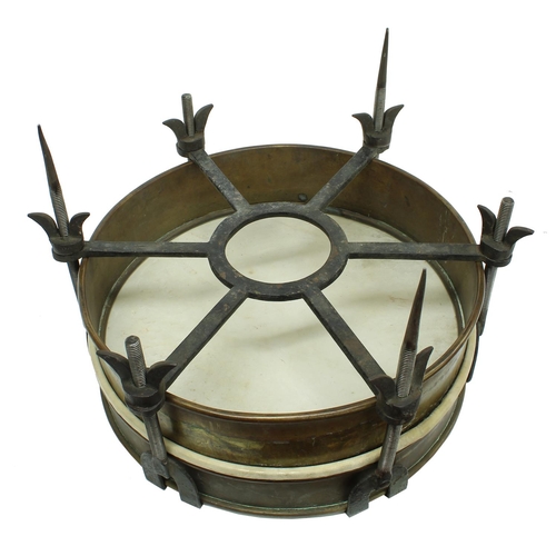 1547 - Brass cased drum with six iron tensioners, three of which are extended to spikes, head diameter 35.0... 