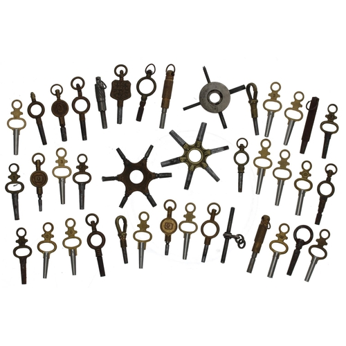 1067 - Collection of assorted pocket watch keys to include two spider keys and a trade key (38 approx)... 