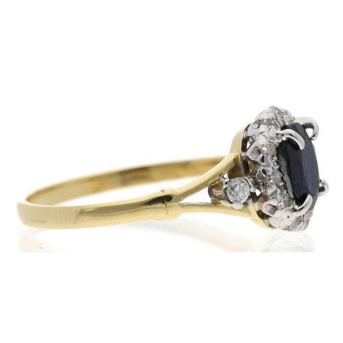 117 - 18ct yellow gold sapphire and diamond oval cluster ring, the sapphire 0.60ct approx, width 10mm, 3.2... 