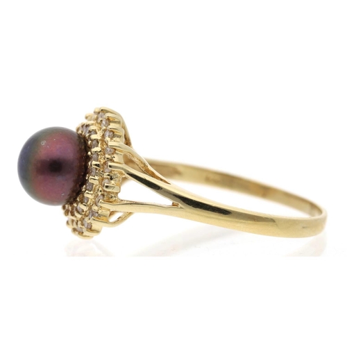 131 - 14ct yellow gold diamond and black pearl cluster ring, the pearl 8mm, 3.4gm, ring size R (623)... 