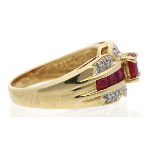 132 - 14ct yellow gold ruby and diamond dress ring, width 10mm, 4.8gm, ring size K/L (624)... 