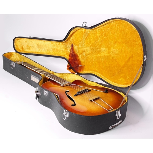 719 - 1950s Besson Aristone archtop guitar, made in Germany; Body: two-tone sunburst finish, heavy buckle ... 