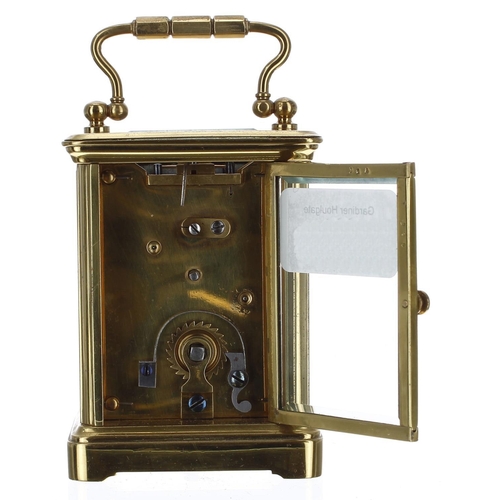 1251 - Small carriage clock timepiece within a corniche brass case, 4.75