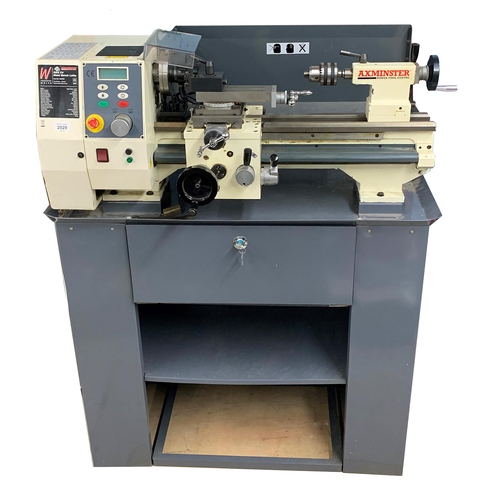 2127 - Axminster Sieg C4 metal bench lathe (part no: 600856), upon a bespoke stand fitted with a long drawe... 