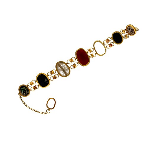 88 - Interesting yellow metal set scarab bracelet, width 20mm, (two pieces missing), 16.4gm, 8