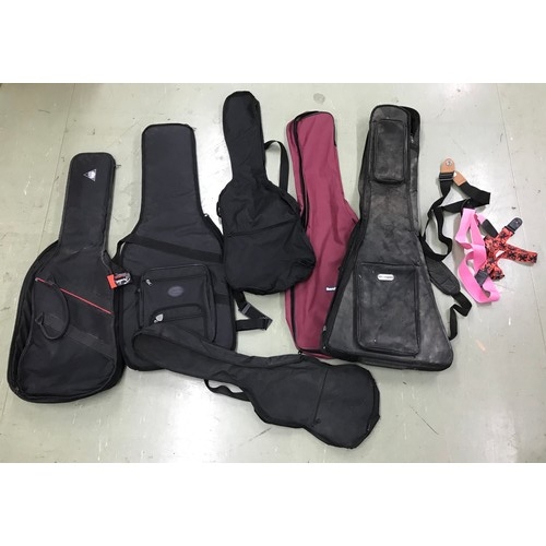 1433 - Selection of various guitar stands; together with approximately five gig bags and a small selection ... 