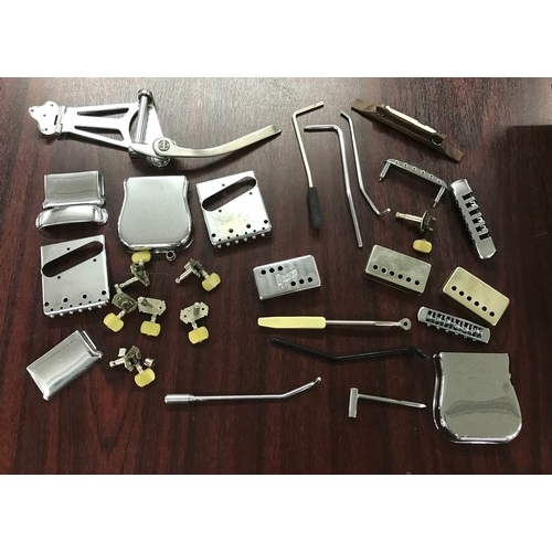 1419 - Selection of guitar hardware to include two Fender branded Telecaster bridge plates with ashtray cov... 