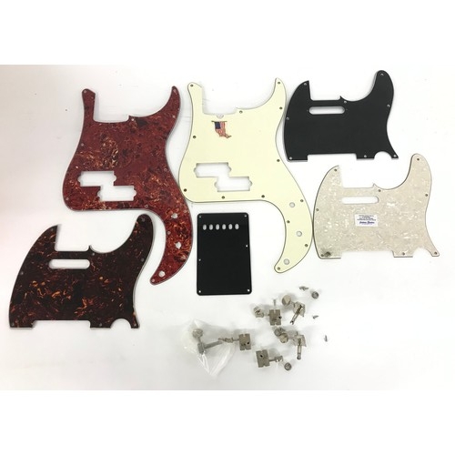 1449 - Three Telecaster pickguards and two Precision Bass pickguards; together with a set of Kluson style g... 