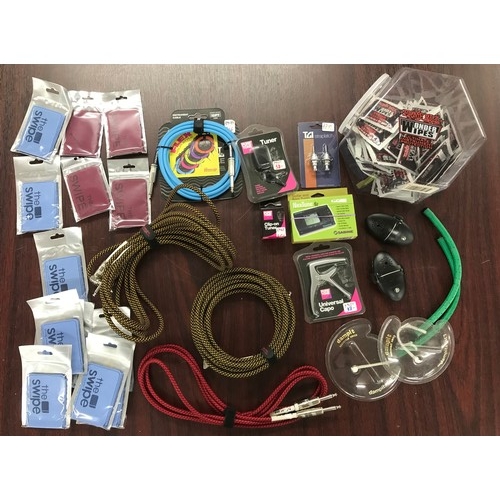 1443 - Selection of guitar accessories and cleaning products to include quality cables, humidifiers, strap ... 