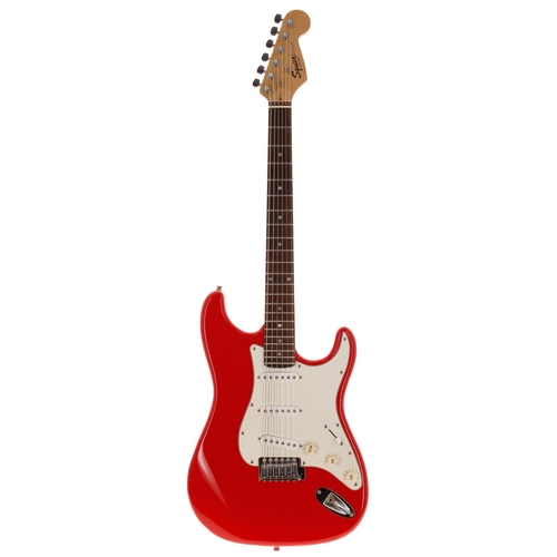 761 - Squier by Fender Strat electric guitar; Body: red finish; Neck: maple; Fretboard: rosewood; Frets: w... 