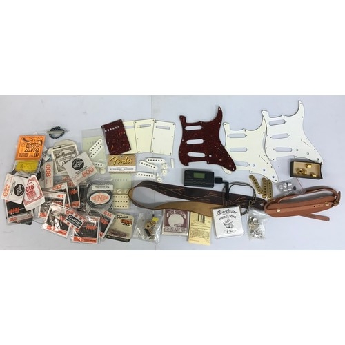 1451 - Selection of guitar spares and accessories to include three Stratocaster scratchplates, a Fender Gen... 