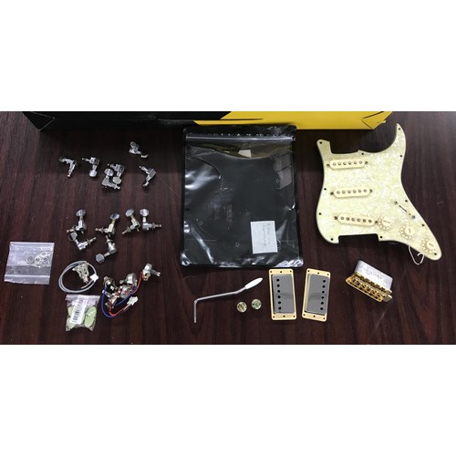 1445 - Selection of guitar spares and accessories to include a 1994 Fender Mexico Stratocaster loaded scrat... 