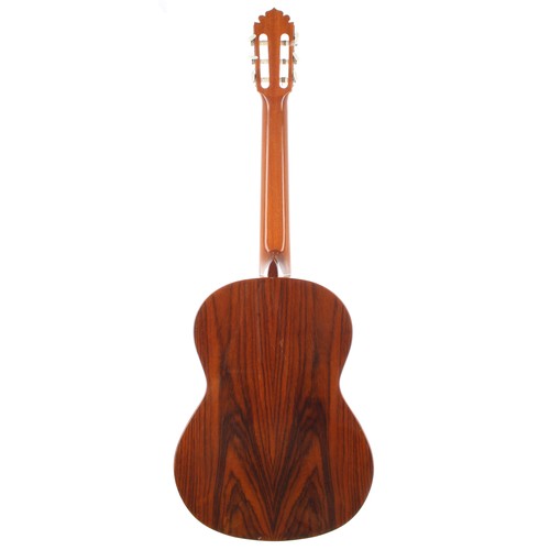 3262 - Manuel Rodriguez Model C3 classical guitar; Back and sides: laminated rosewood; Top: natural cedar; ... 