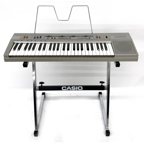 3022 - Casio Casiotone CT-310 keyboard, with original box; together with a metal frame keyboard stand*Pleas... 