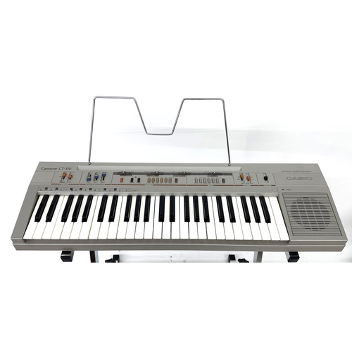 3022 - Casio Casiotone CT-310 keyboard, with original box; together with a metal frame keyboard stand*Pleas... 