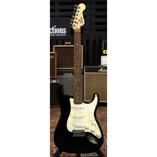 753 - Squier by Fender Strat electric guitar, black finish, soft bag