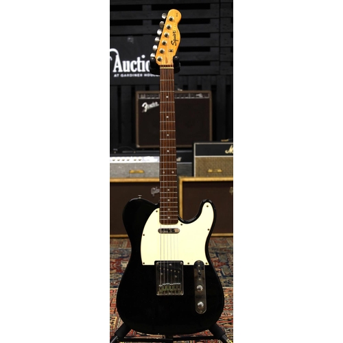 764 - 1998 Squier by Fender Affinity Series Tele electric guitar, black finish (imperfections); together w... 