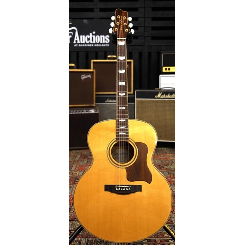 874 - James Neligan NA573 acoustic guitar; Back and sides: laminated natural maple; Top: natural solid spr... 