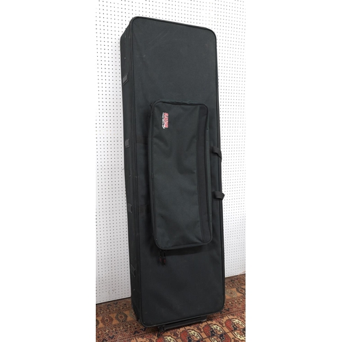 3044 - Gator keyboard/stage piano rigid foam gig case on wheels