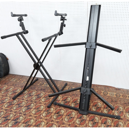 3056 - Millennium KS3000 keyboard stand; together with a Tiger dual keyboard stand (2)