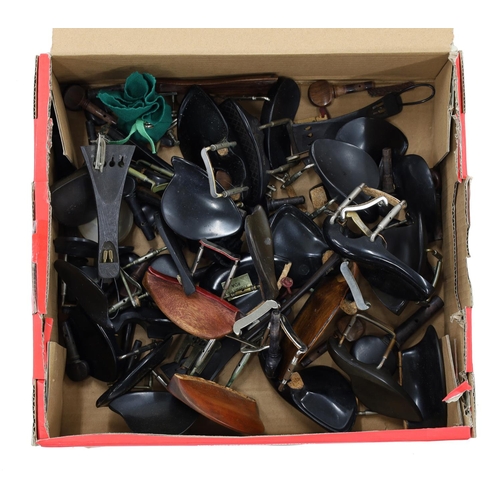 2085 - Box of various used stringed instrument fittings, including chin rests, pegs and tailpieces... 