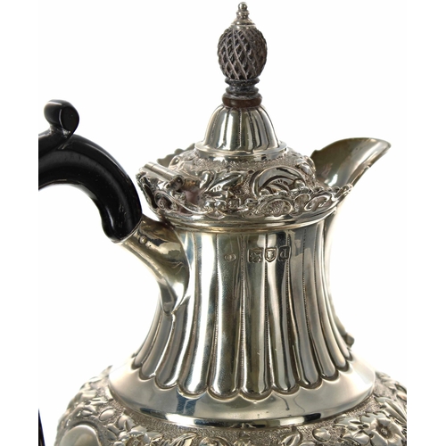 501 - Late Victorian silver pedestal coffee pot, the hinged cover with pineapple finial over a repousse bo... 