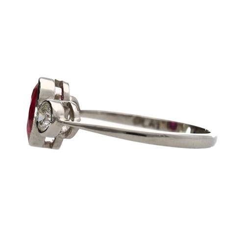 102 - Attractive modern platinum diamond and glass-filled ruby three stone ring, the oval centre stone wit... 