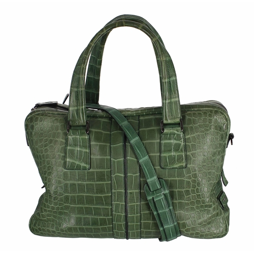 604 - Tod's green crocodile skin leather handbag, made in Italy, bearing a chrome 'Unique001' plaque to th... 