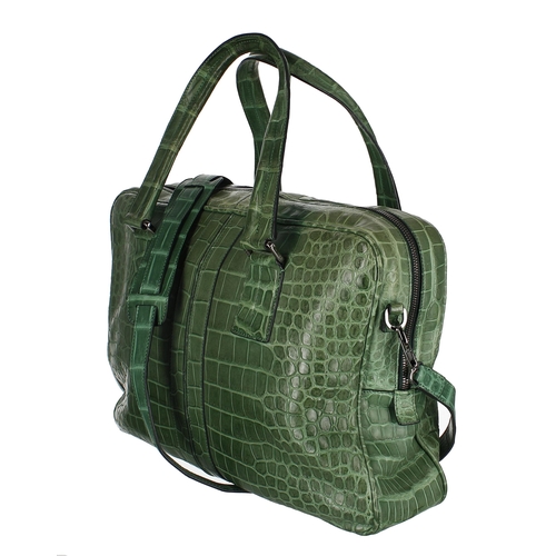 604 - Tod's green crocodile skin leather handbag, made in Italy, bearing a chrome 'Unique001' plaque to th... 