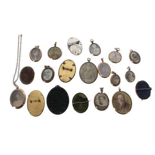 664 - Group of twenty WWI/WWII photograph brooches, pendants and framed miniatures, some with images to bo... 