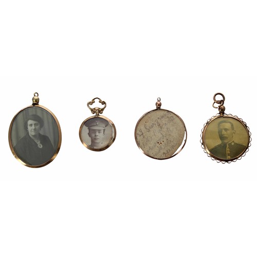 670 - Four 9ct double sided photograph pendants, featuring portraits of uniformed officers, one with full ... 