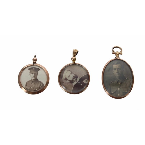 671 - Three 9ct gold double sided photograph pendants, featuring the portraits of uniformed officers and t... 