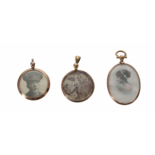 671 - Three 9ct gold double sided photograph pendants, featuring the portraits of uniformed officers and t... 