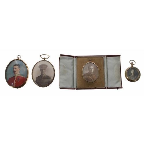 673 - Miniature oval portrait of an officer in red tunic, an overpainted photograph signed Mayall, 3.75