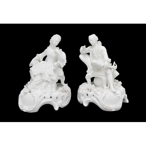 727 - Pair of French Charles Levy blanc de chine white porcelain figures, modelled as a seated gentleman a... 