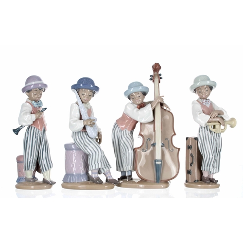 729 - Lladró - four porcelain jazz band figures; trumpeter, clarinettist, saxophonist and double bassist, ... 