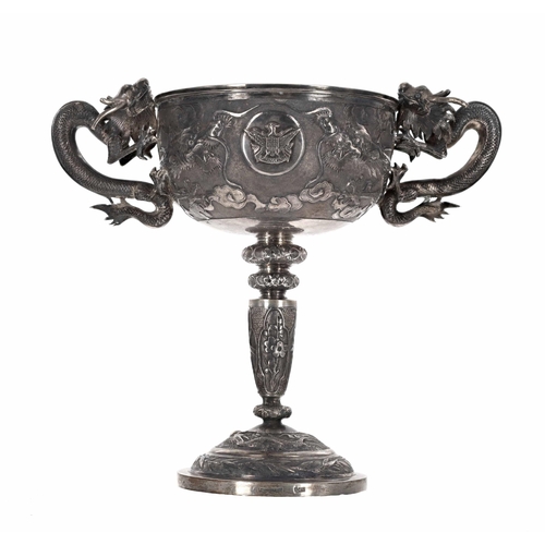 743 - Late 19th/early 20th century Chinese export white metal twin-handled pedestal goblet, with repousse ... 