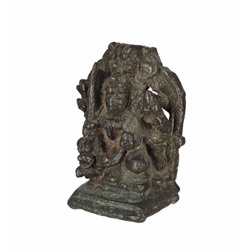 771 - Small Indian/Tibetan bronze figure, possibly a deity figure, cast seated on a throne holding a sword... 