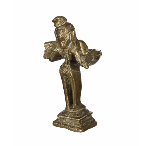 772 - Indian bronze figure of Deepalakshmi, cast standing and holding the oil lamp font dish, 5