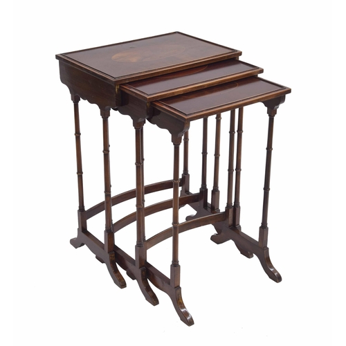 955 - Regency style mahogany nest of three side tables, each with an inlaid oval paterae to the top, on sl... 