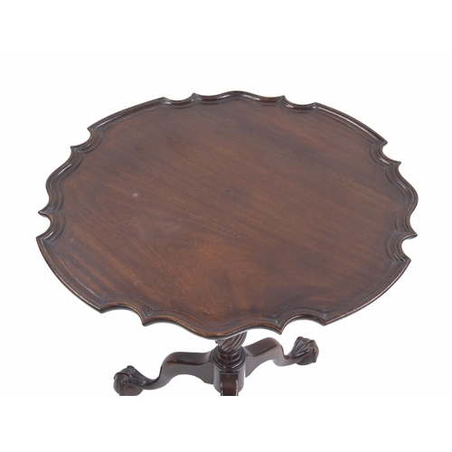 998 - Georgian style mahogany circular tilt-top side table, the moulded 'pie crust' top upon a central tur... 