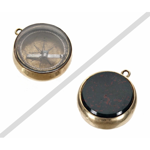 592 - 18ct gold and blood stone pendant compass, 1