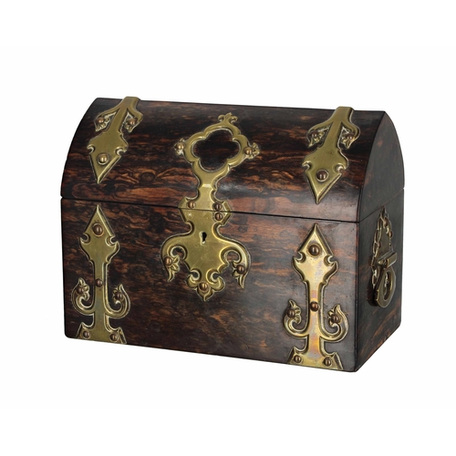 635 - 19th century coromandel and brass strap mounted tea caddy, the lancet arched hinged cover enclosing ... 