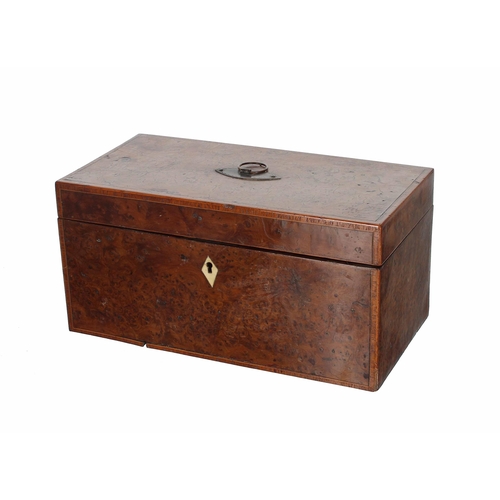 643 - Georgian yew wood cross banded tea caddy, of rectangular form, the hinged cover enclosing two tea di... 