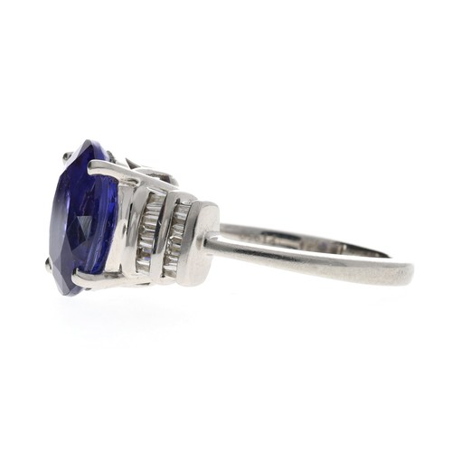 104 - Good 18ct white gold tanzanite and diamond dress ring, the tanzanite of good colour 4.70ct approx, w... 
