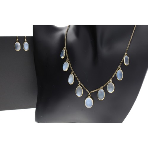 118 - Attractive gilt moonstone set necklace with matching earrings, the necklace set with nine graduated ... 