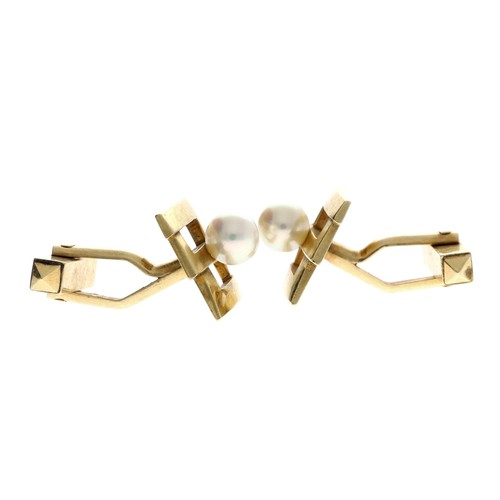 294 - Pair of K. Mikimoto, Tokyo 14ct yellow gold cultured pearl cufflinks, the pearls 6mm, signed, 9.4gm,... 