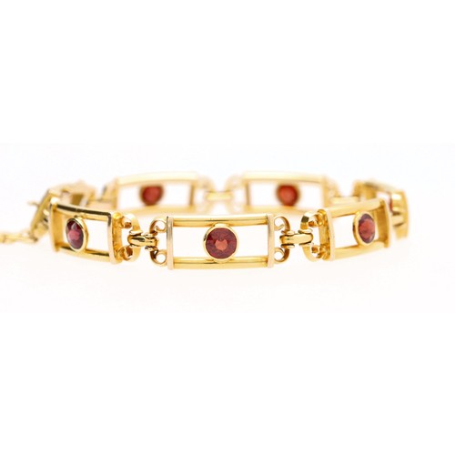 295 - Attractive antique 15ct yellow gold garnet set gate bracelet, with seven rub-over set round garnets,... 