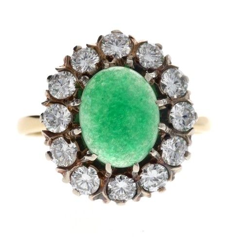 318 - Attractive 18ct cabouchon aventurine quartz and diamond oval cluster ring, the quartz 1.20ct approx,... 